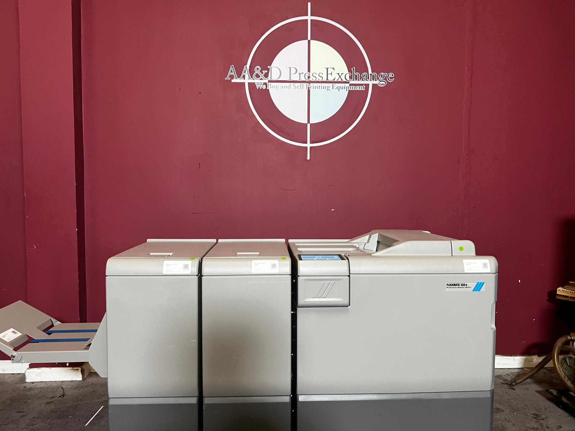Used Plockmatic 350e 31k Meter booklet maker front view in digital print setup – AA&D PressExchange