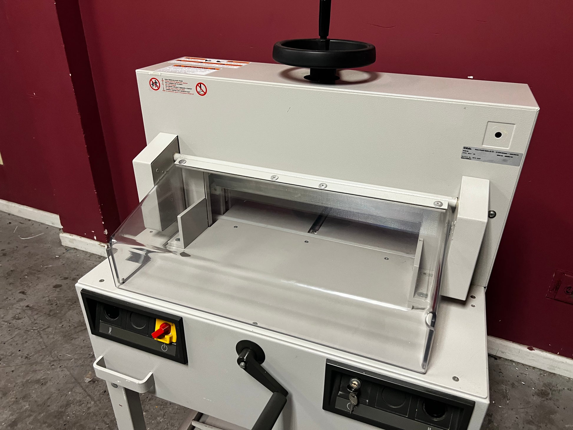 Used Triumph 4810-95 paper cutter rear view highlighting cutting mechanism – AA&D PressExchange