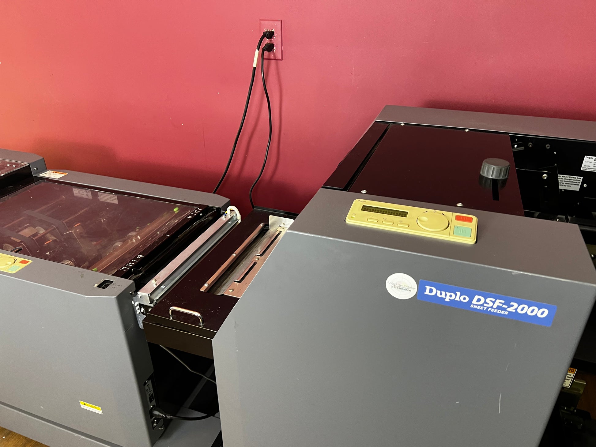 Used Duplo DBM-2000 booklet maker close-up of tray – AA&D PressExchange