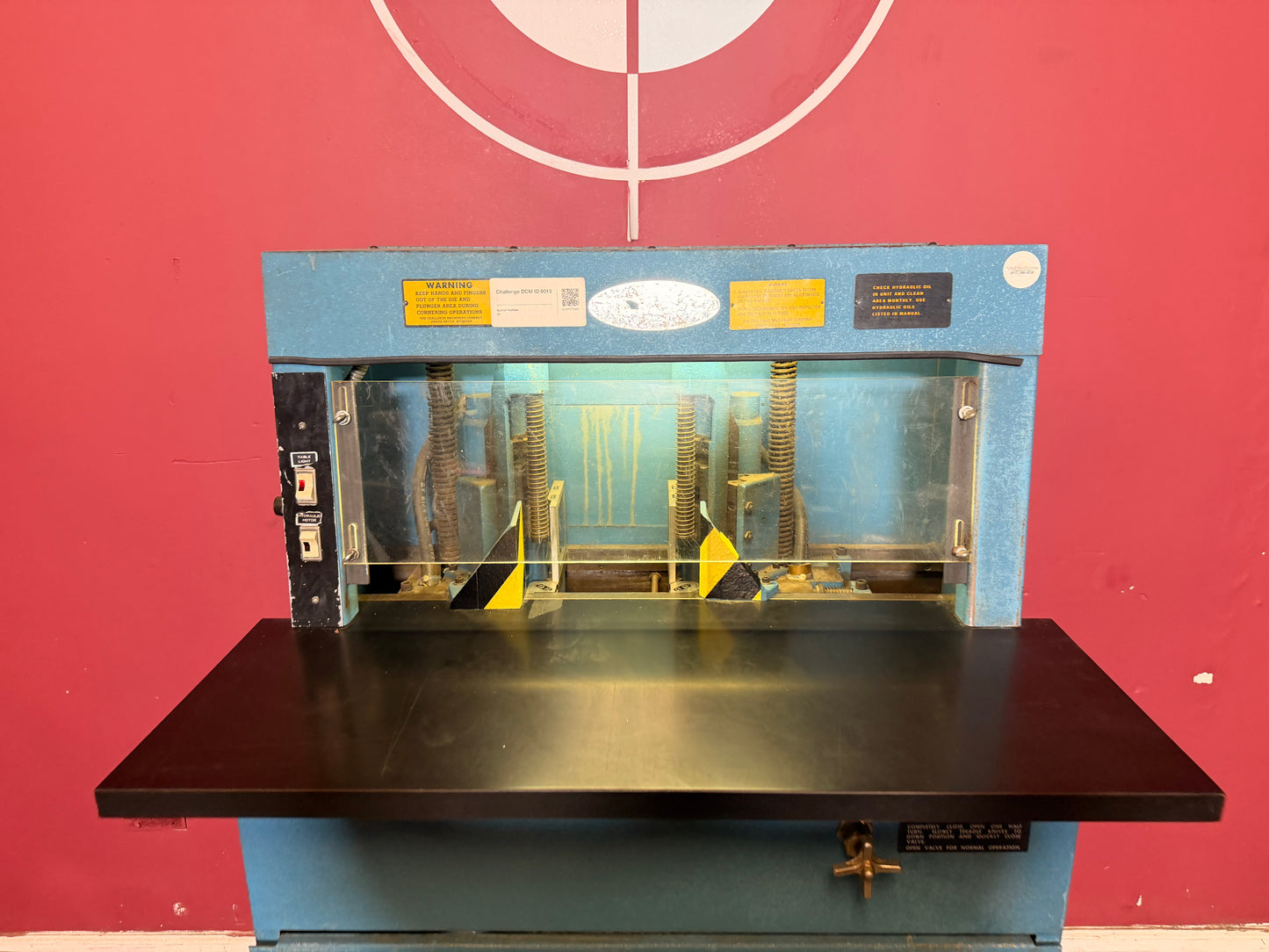 Used Challenge DCM Double Round Cornering Machine rear view with gravity chip disposal system