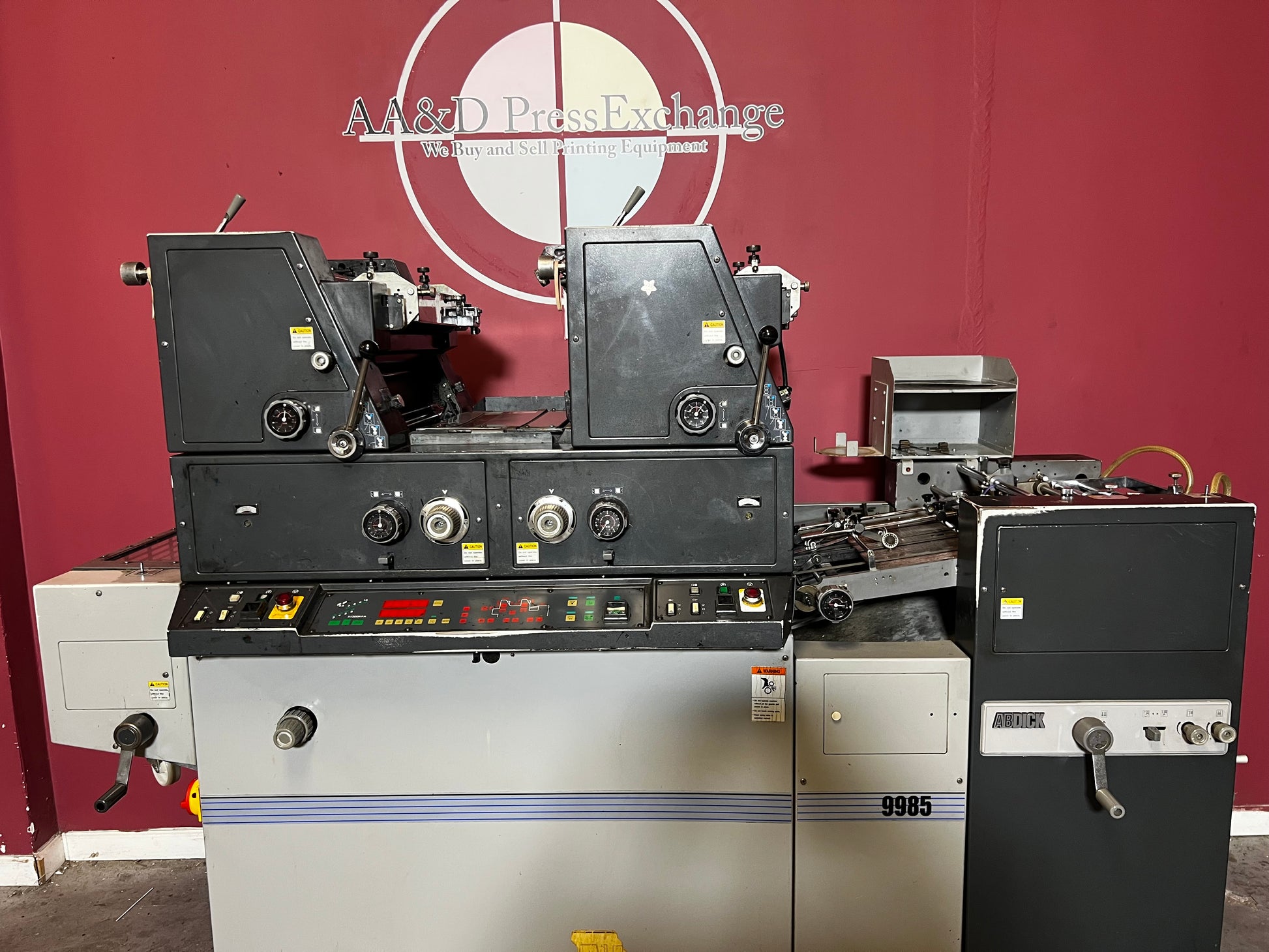 Used AB Dick 9985 dual-color offset printing press side profile – AA&D PressExchange