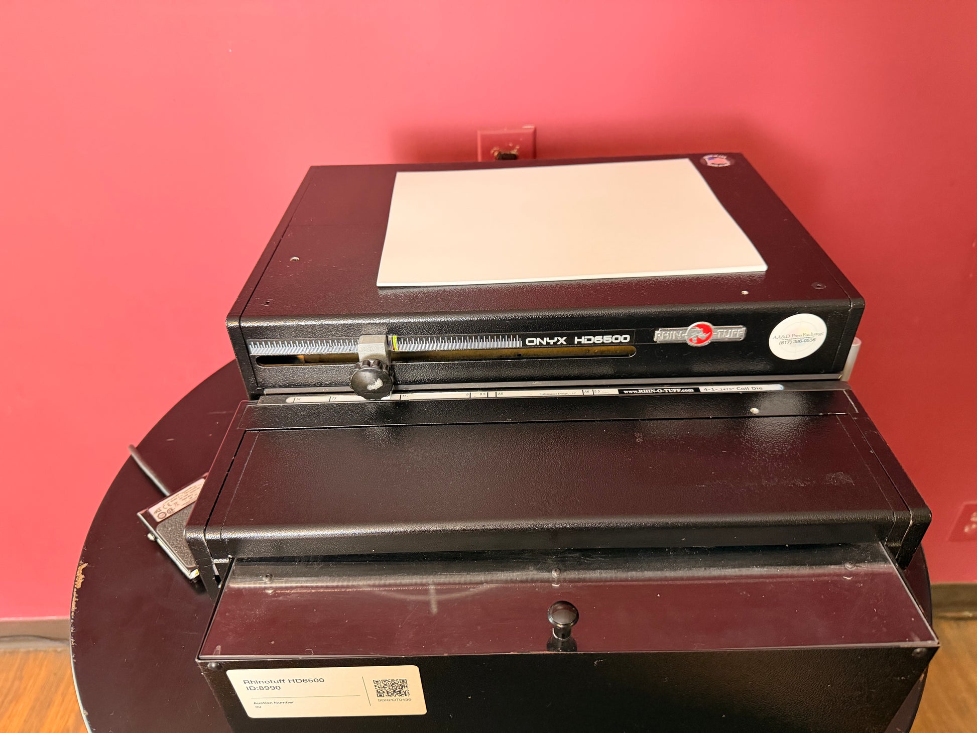 Used Rhin-O-Tuff Onyx 6500 4:1 Die angled view showing paper feed area – AA&D PressExchange