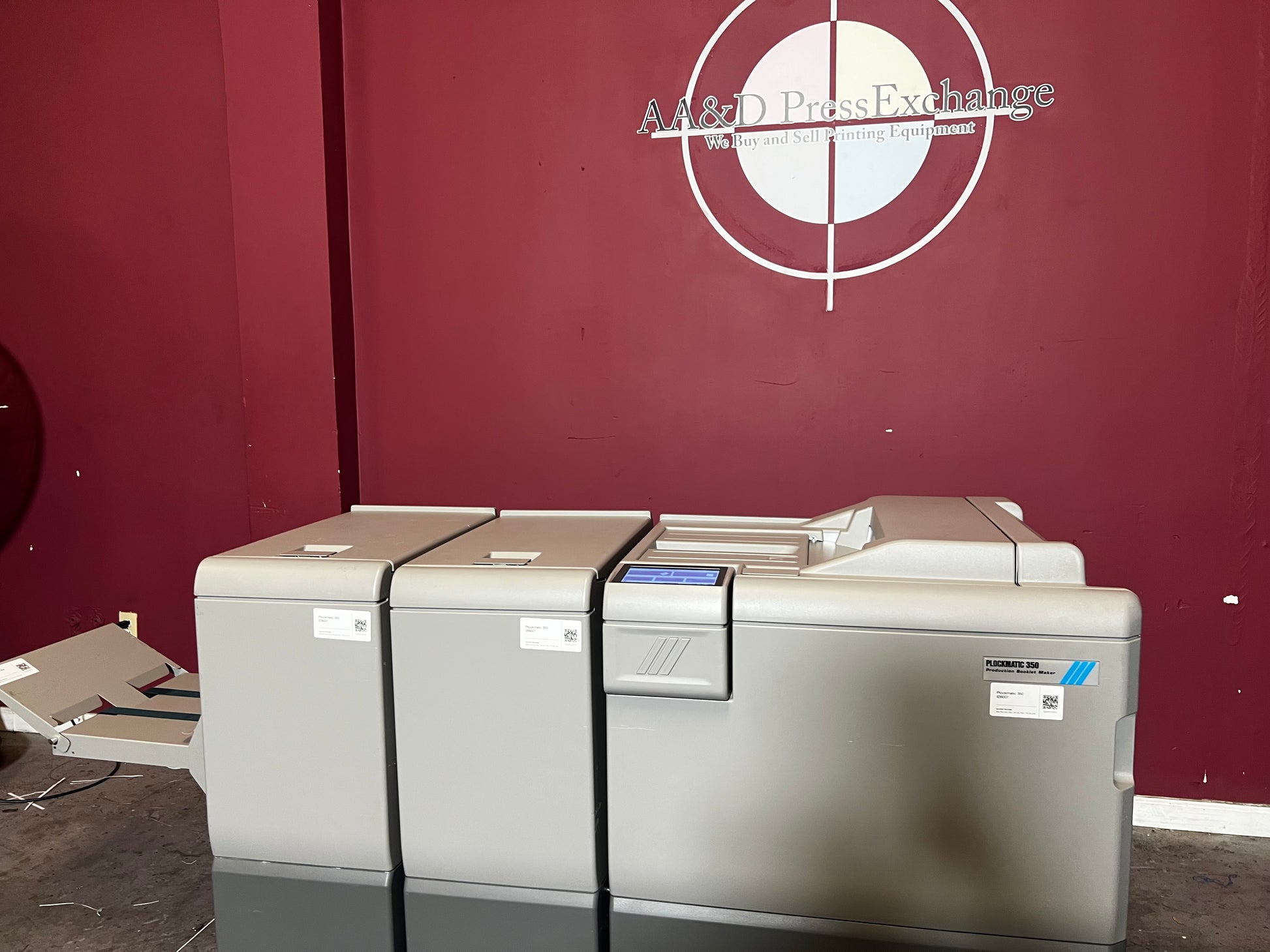 Used Plockmatic 350 booklet maker 60k meter close-up of feed and trim sections – AA&D PressExchange