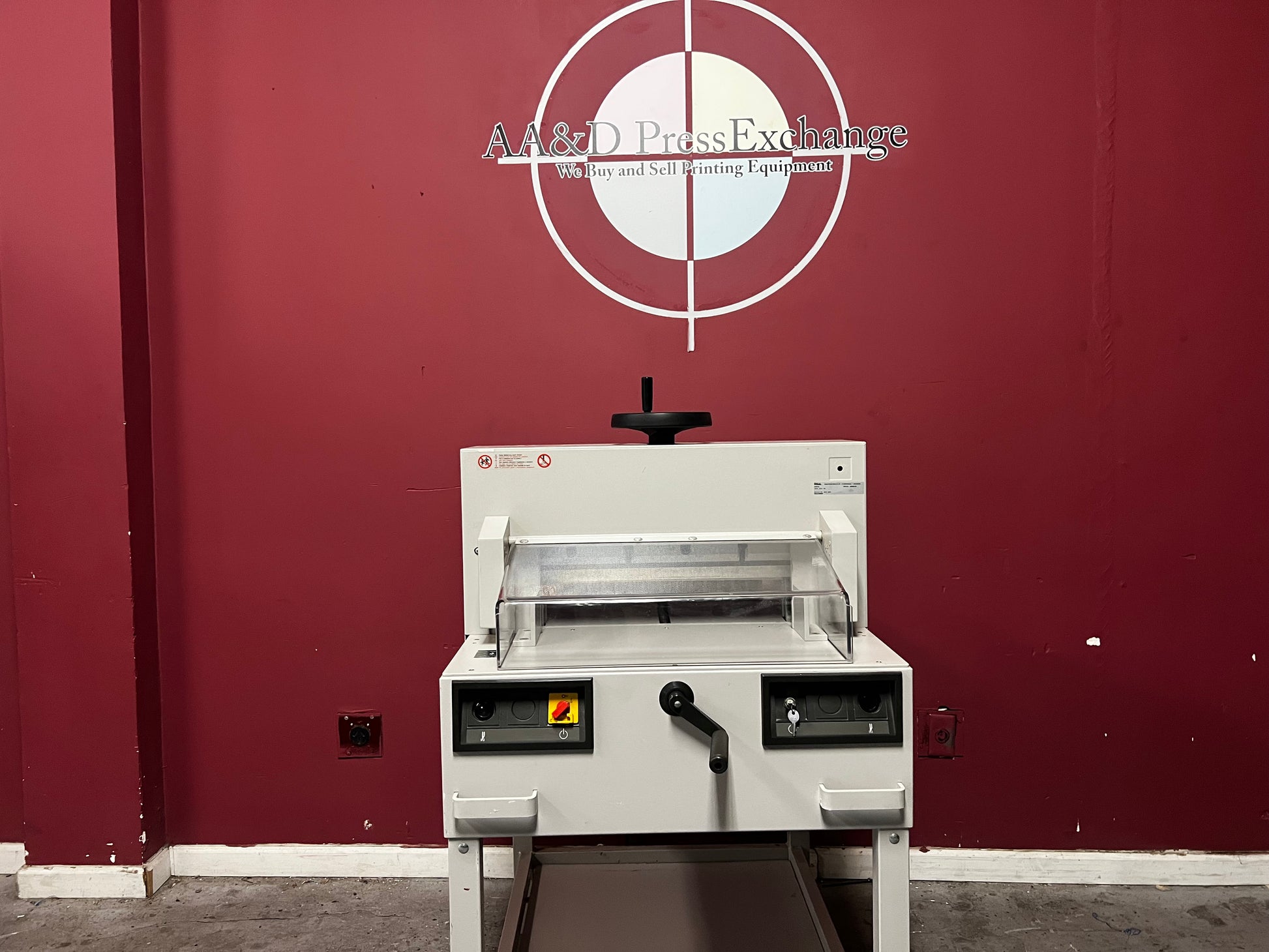 Used Triumph 4810-95 paper cutter angled view showing guillotine cutting surface – AA&D PressExchange