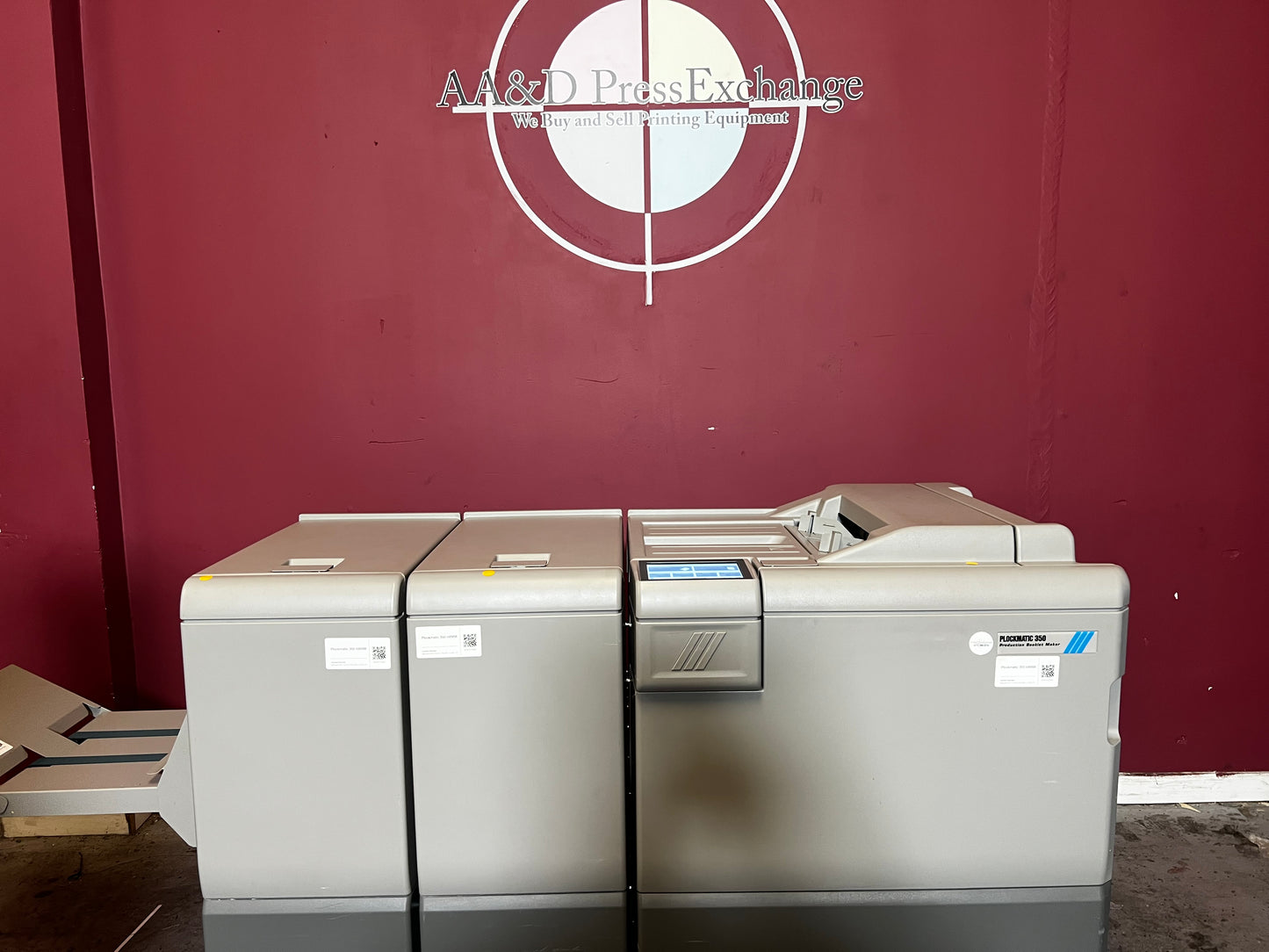 Used Plockmatic 350 200k meter booklet maker detailed close-up of folding and square back trim module – AA&D PressExchange