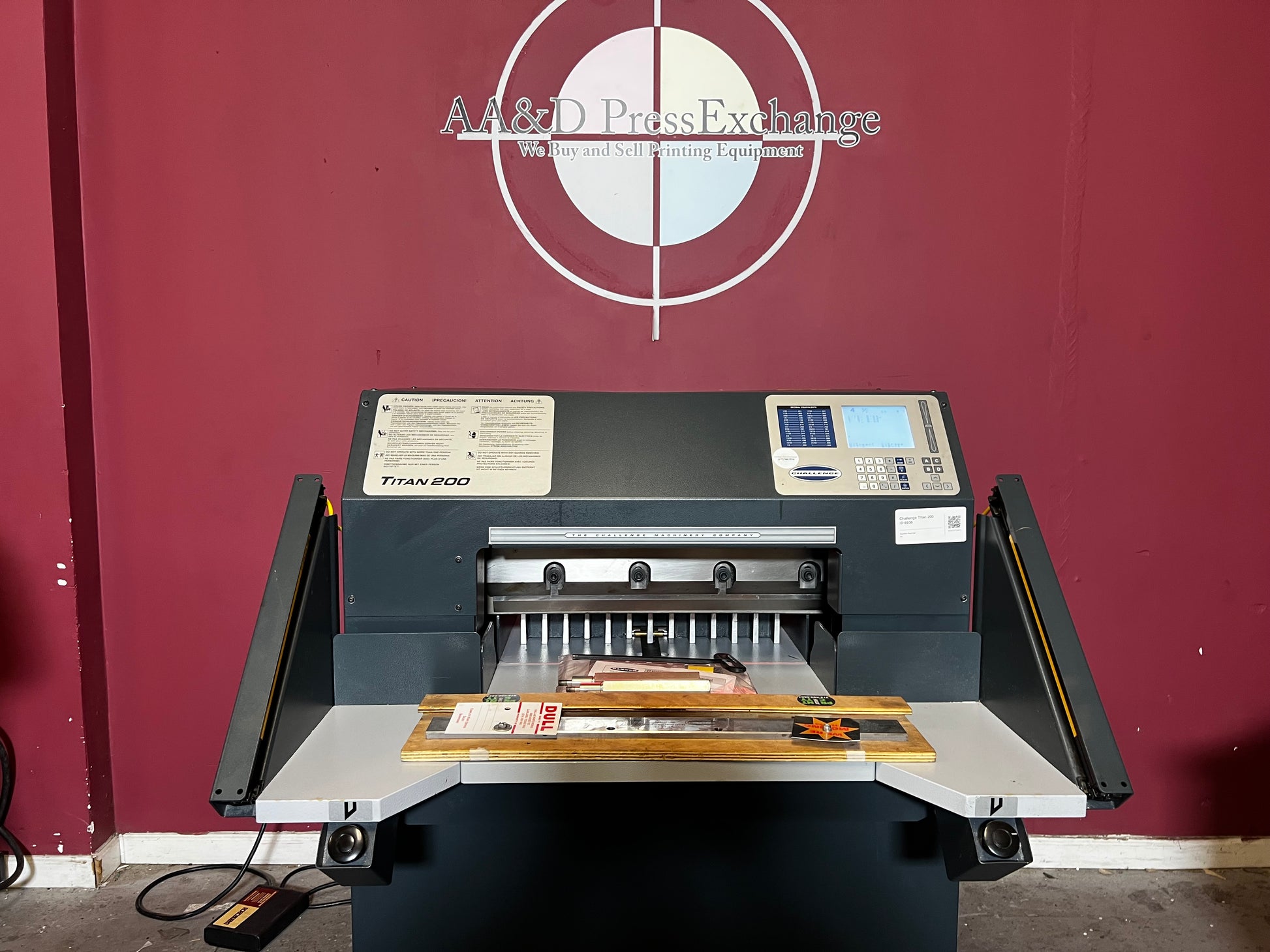 Used Challenge Titan 200C hydraulic paper cutter detailed shot of knife latch and safety features – AA&D PressExchange