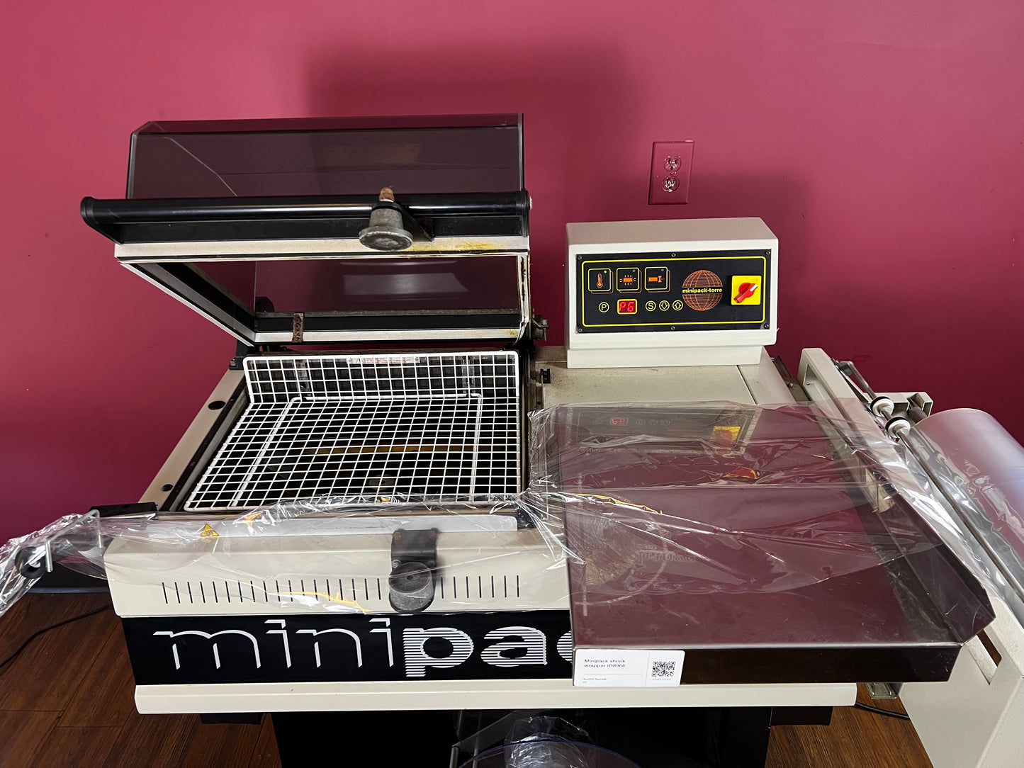 Used Minipack FM-75 Digit shrink wrap machine rear view | AA&D PressExchange