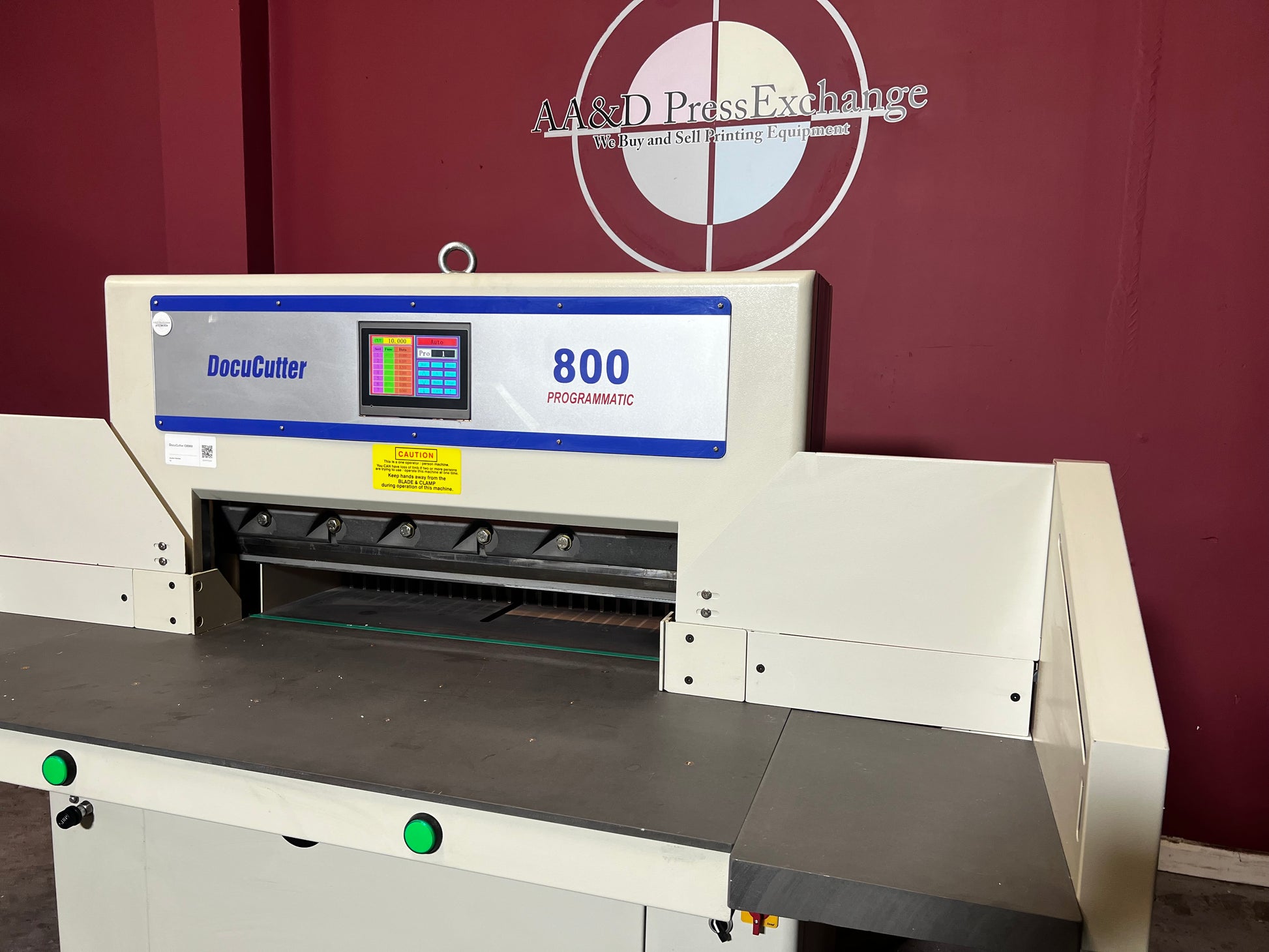 Used Duplo Docucutter 800 Programmatic paper cutter angled view of cutting bed – AA&D PressExchange