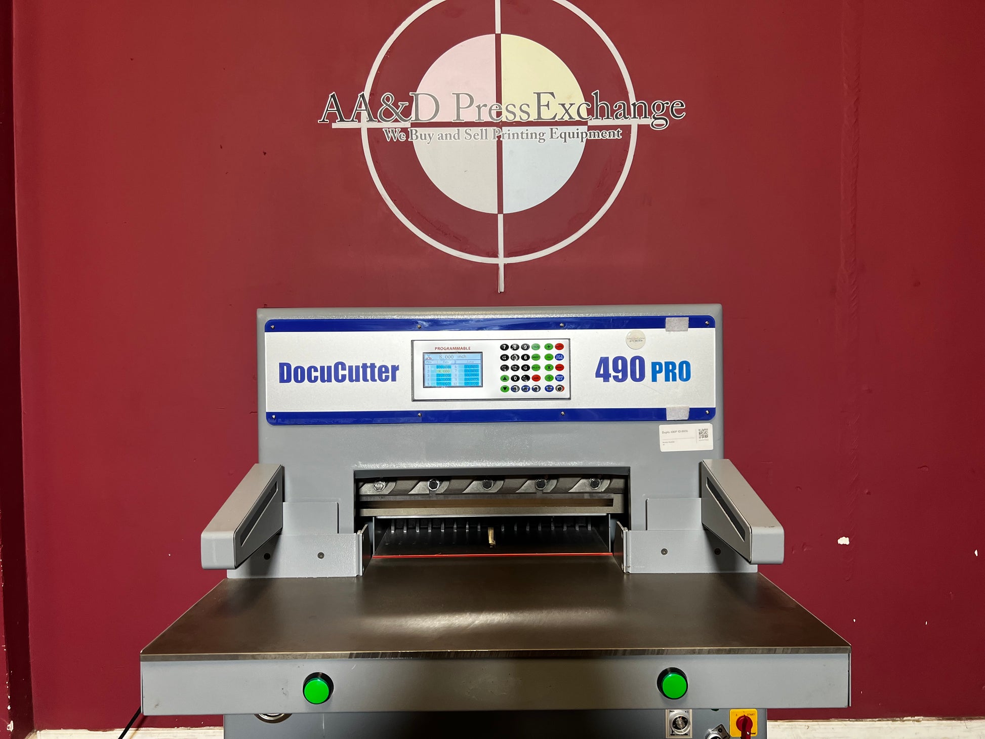 AA&D PressExchange Used Duplo 490 PRO hydraulic paper cutter rear view highlighting hydraulic components