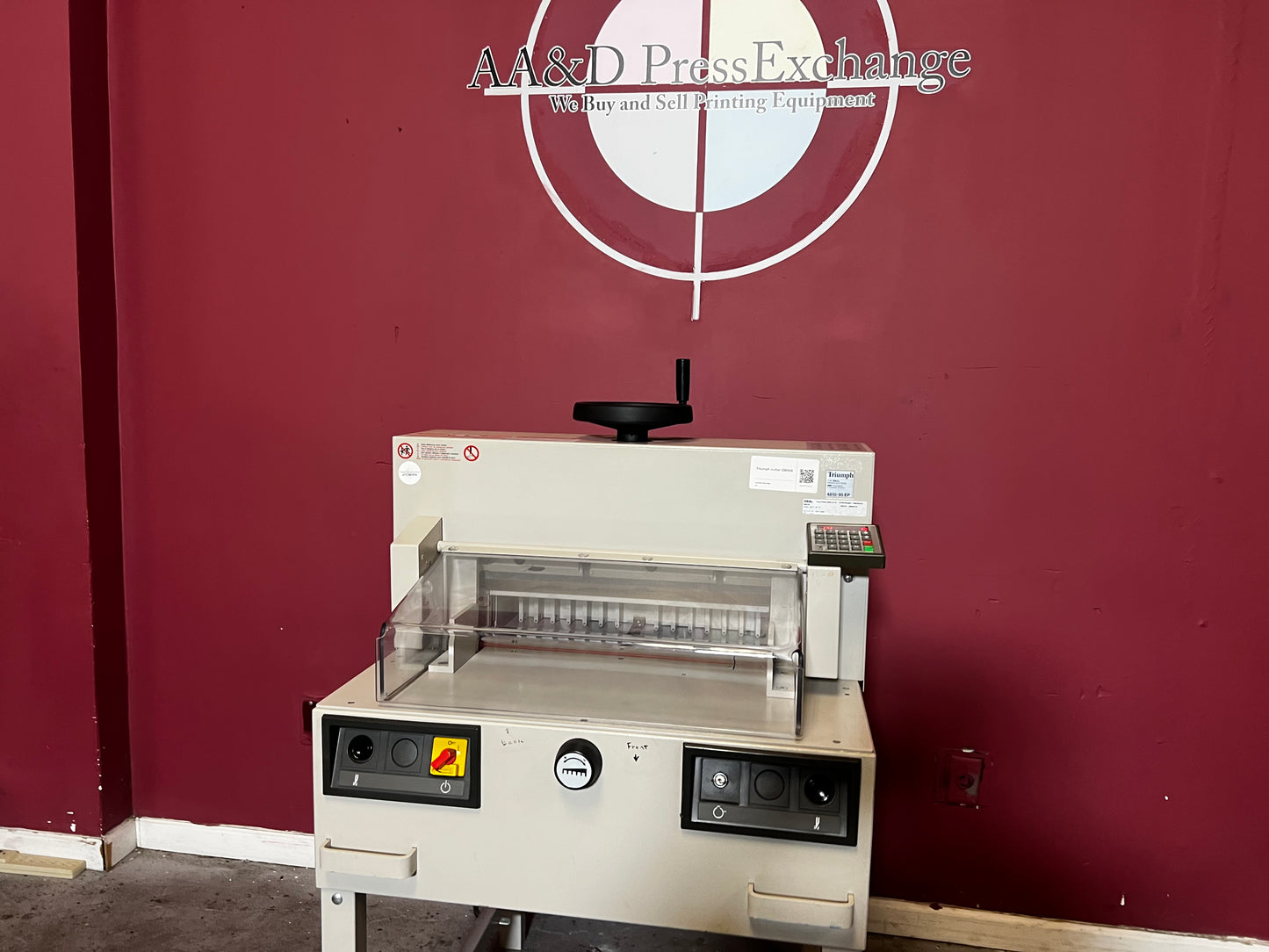 Used Triumph 4810-95EP guillotine paper cutter angled view showing control panel – AA&D PressExchange