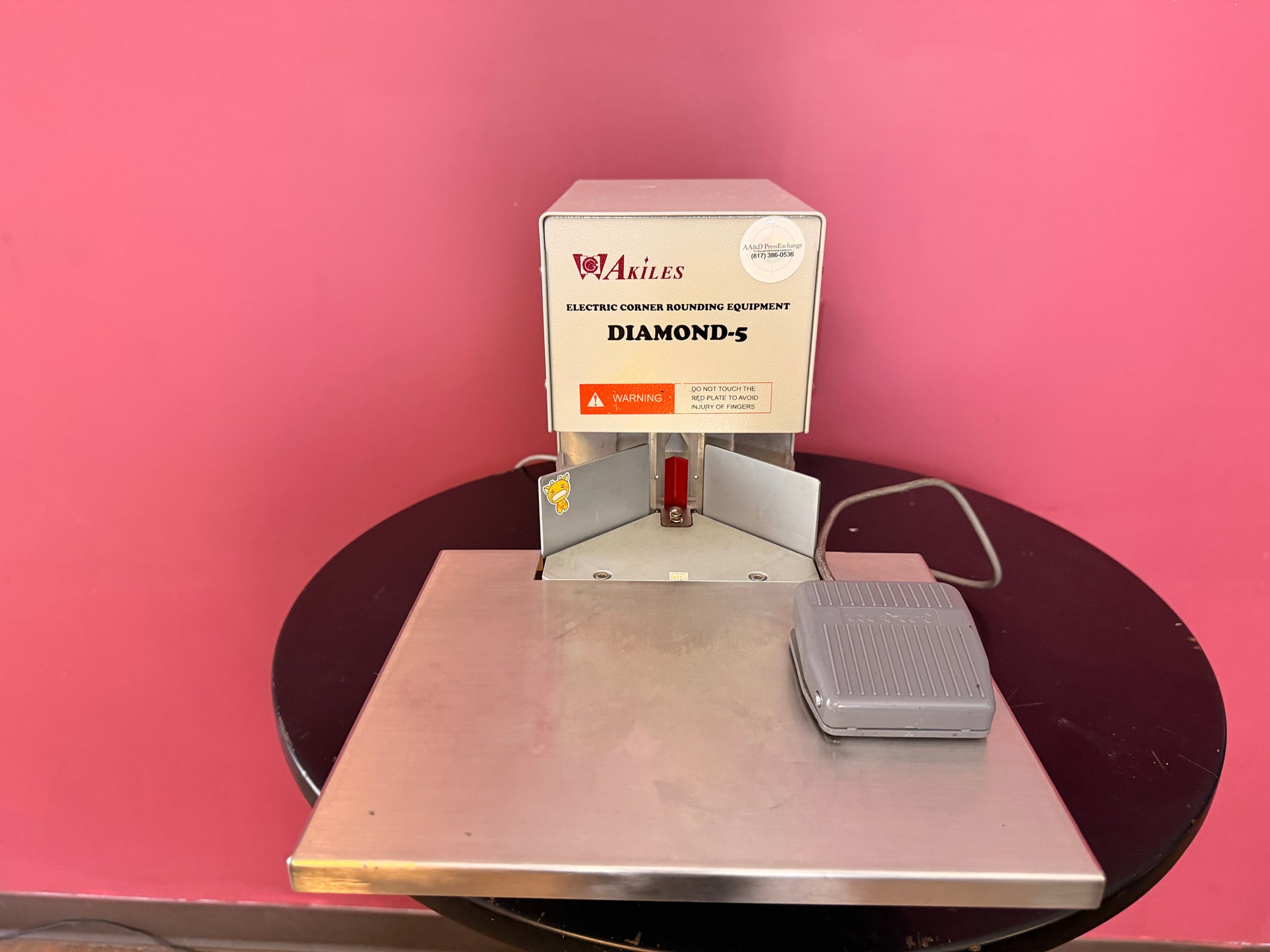 Used Akiles Diamond-5 corner rounder close-up of sturdy base and non-slip feet – AA&D PressExchange