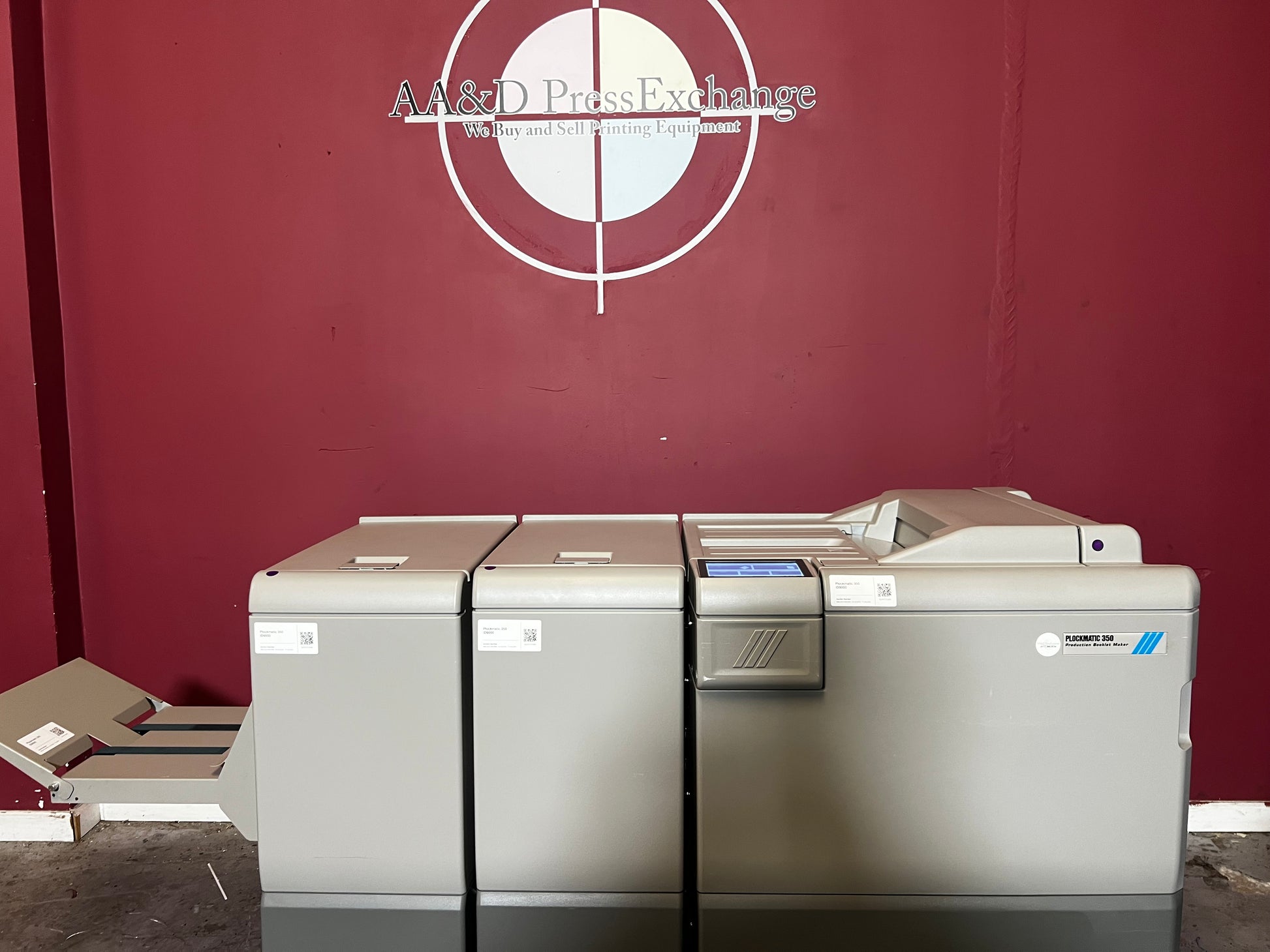 Used Plockmatic 350 90k booklet maker side view connected to digital press – AA&D PressExchange