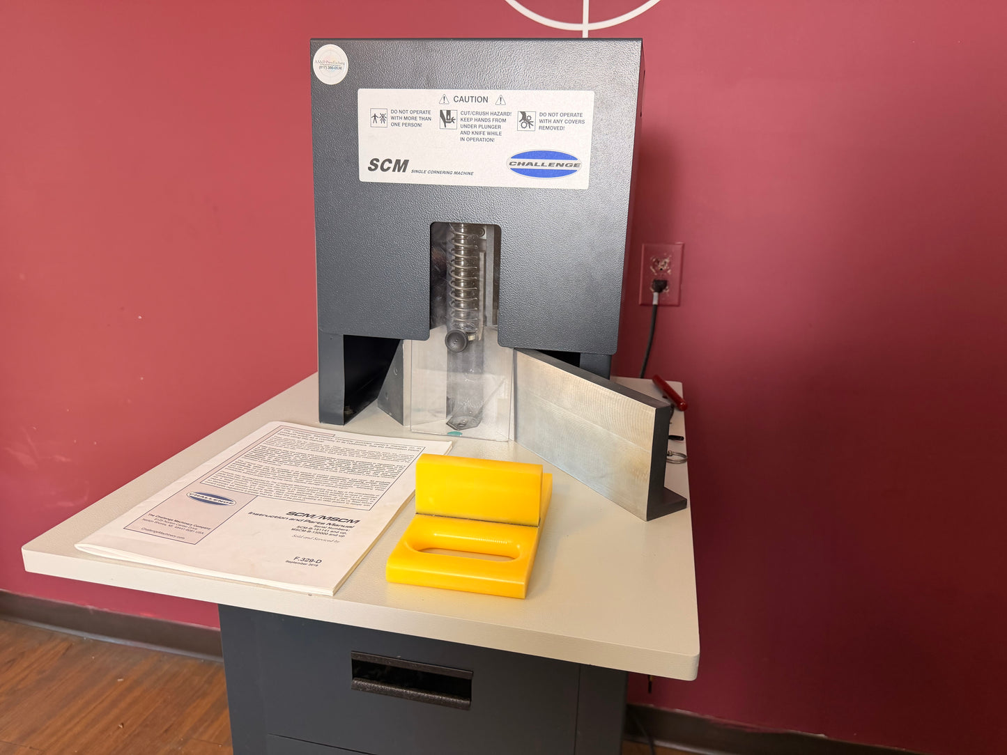 Used Challenge SCM corner rounder showing interchangeable rounding dies – AA&D PressExchange