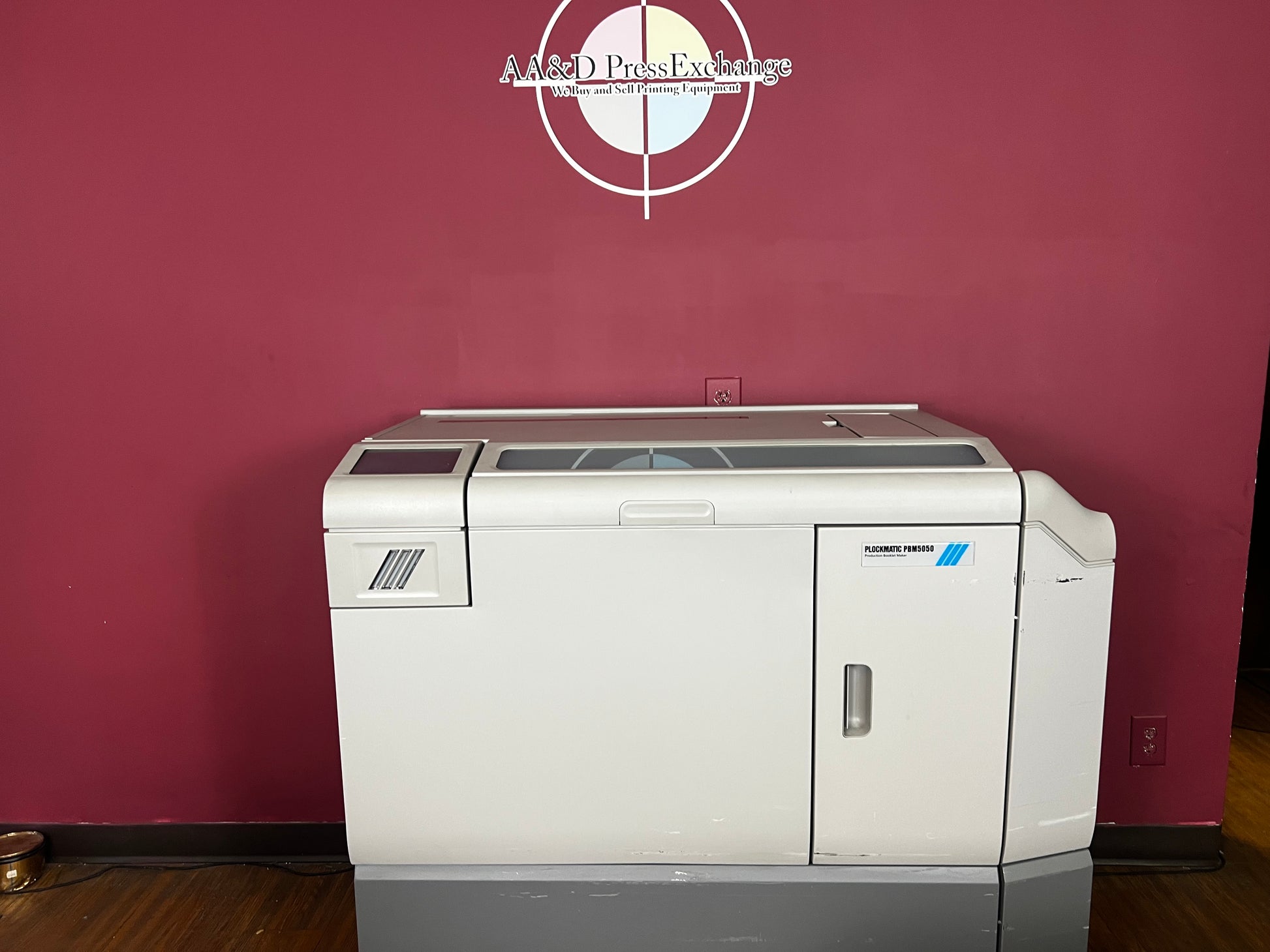 Used Plockmatic 5050 bookletmaker 63k meter front view in production environment – AA&D PressExchange
