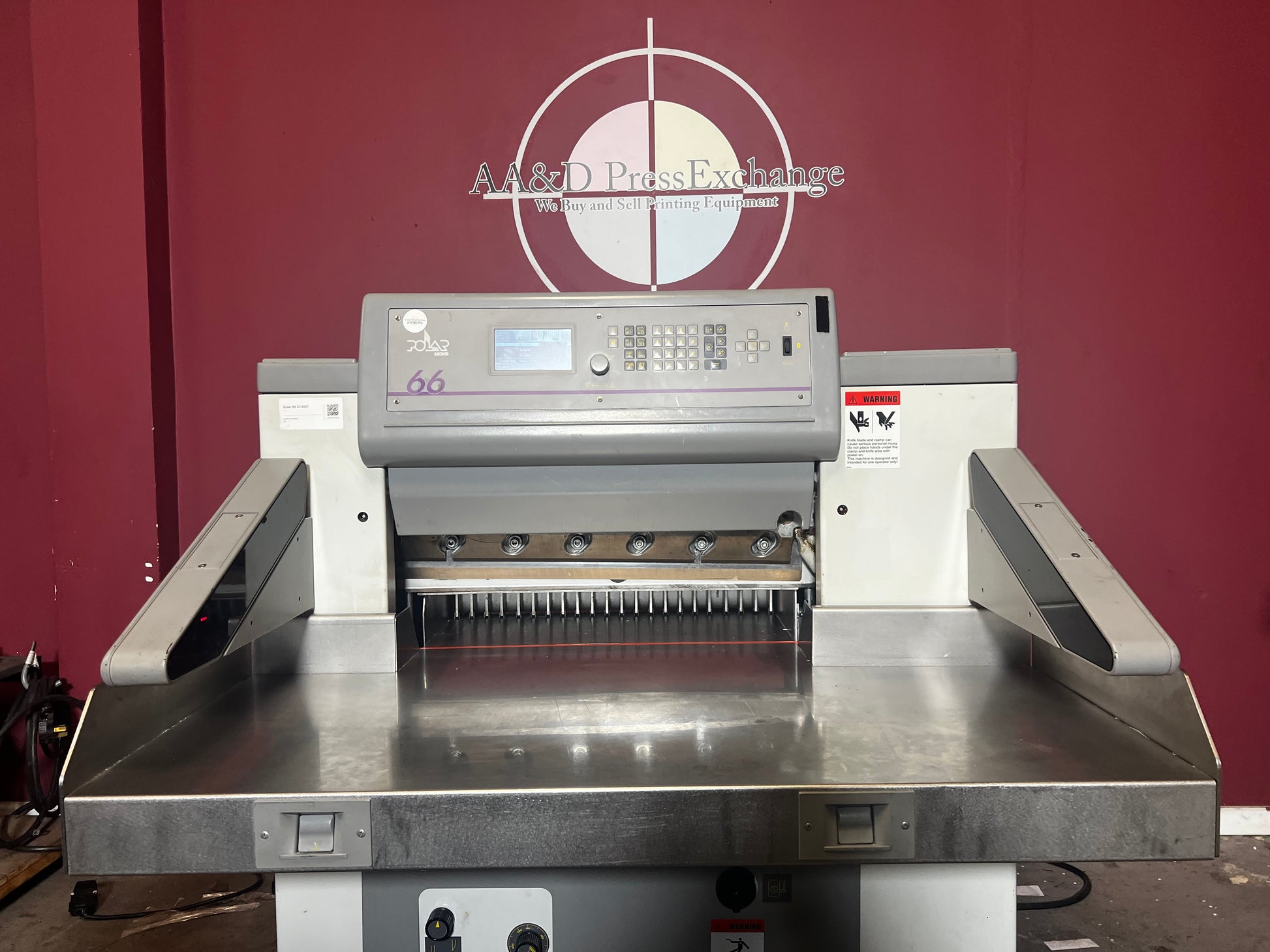 Used Polar 66 programmable guillotine cutter angled view – AA&D PressExchange