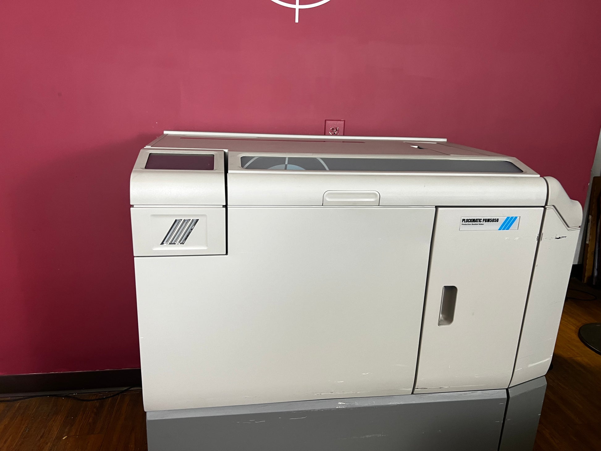 Used Plockmatic 5050 bookletmaker 63k meter rear/side view highlighting booklet output tray – AA&D PressExchange