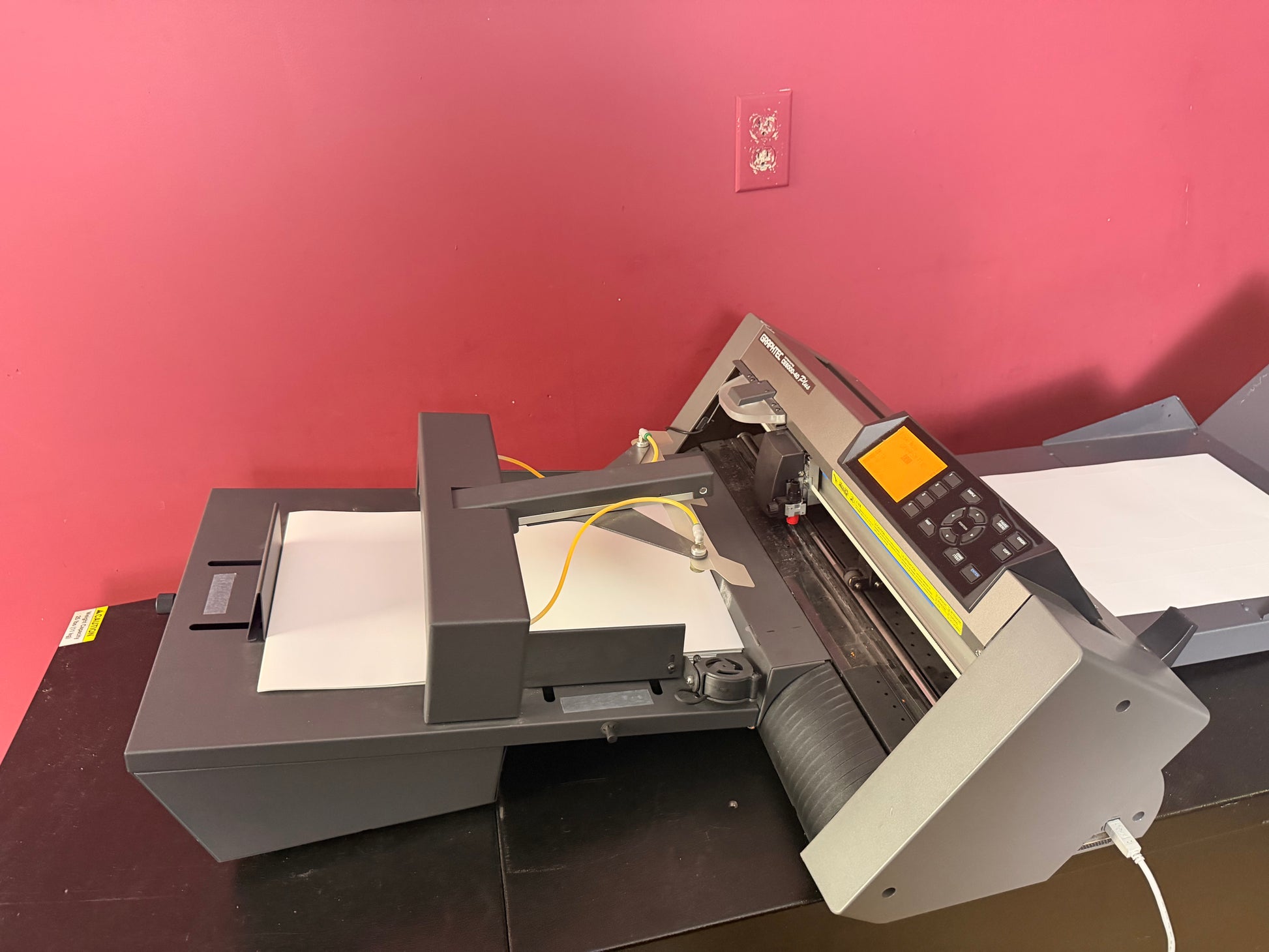Used Graphtec CE-6000-40 Plus F-Mark Feeder side view with compact cutting system