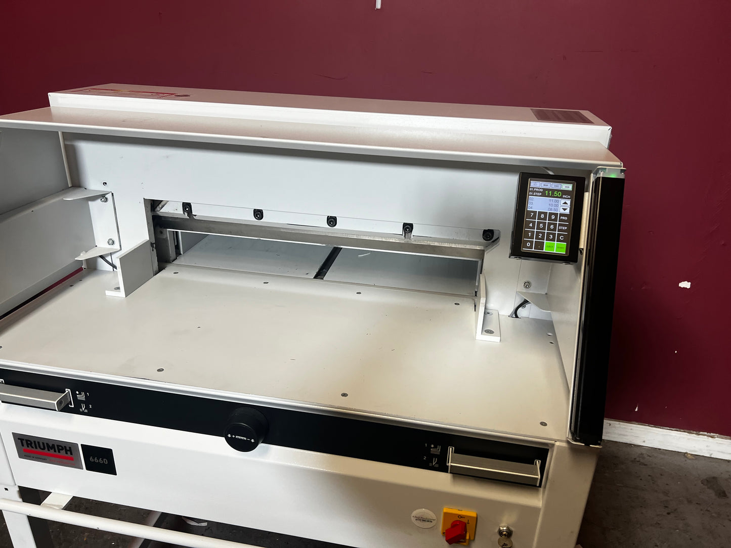 Used Triumph 6660 paper cutter view of digital user interface and blade position controls – AA&D PressExchange