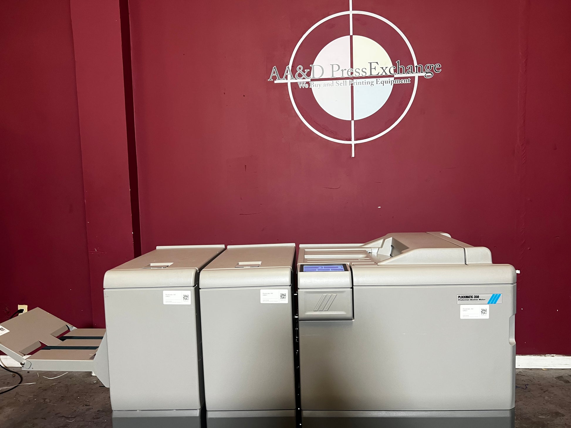 Used Plockmatic 350 booklet maker 60k meter angled view of fold and trim modules – AA&D PressExchange
