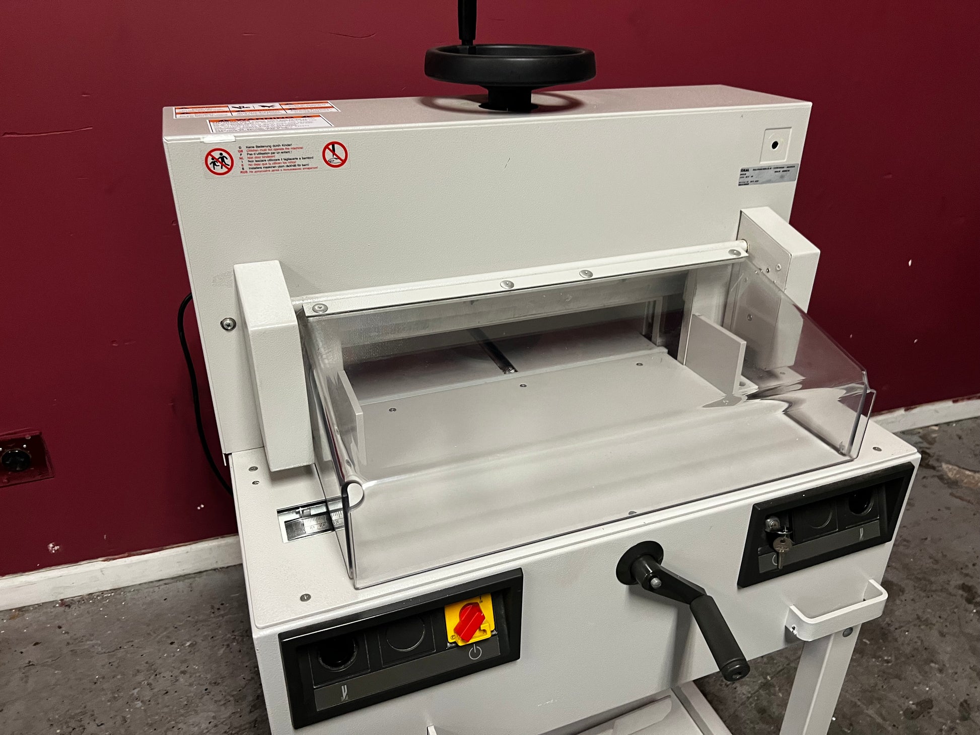 Used Triumph 4810-95 electric cutter close-up of manual clamp and back gauge – AA&D PressExchange