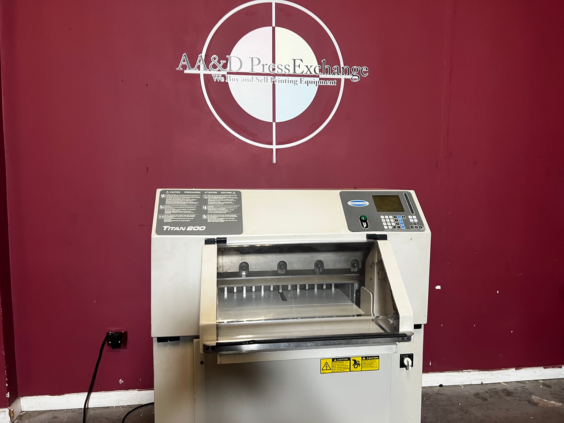 Close-up of used Challenge Titan 200 Hydraulic Paper Cutter control panel, AA&D PressExchange.