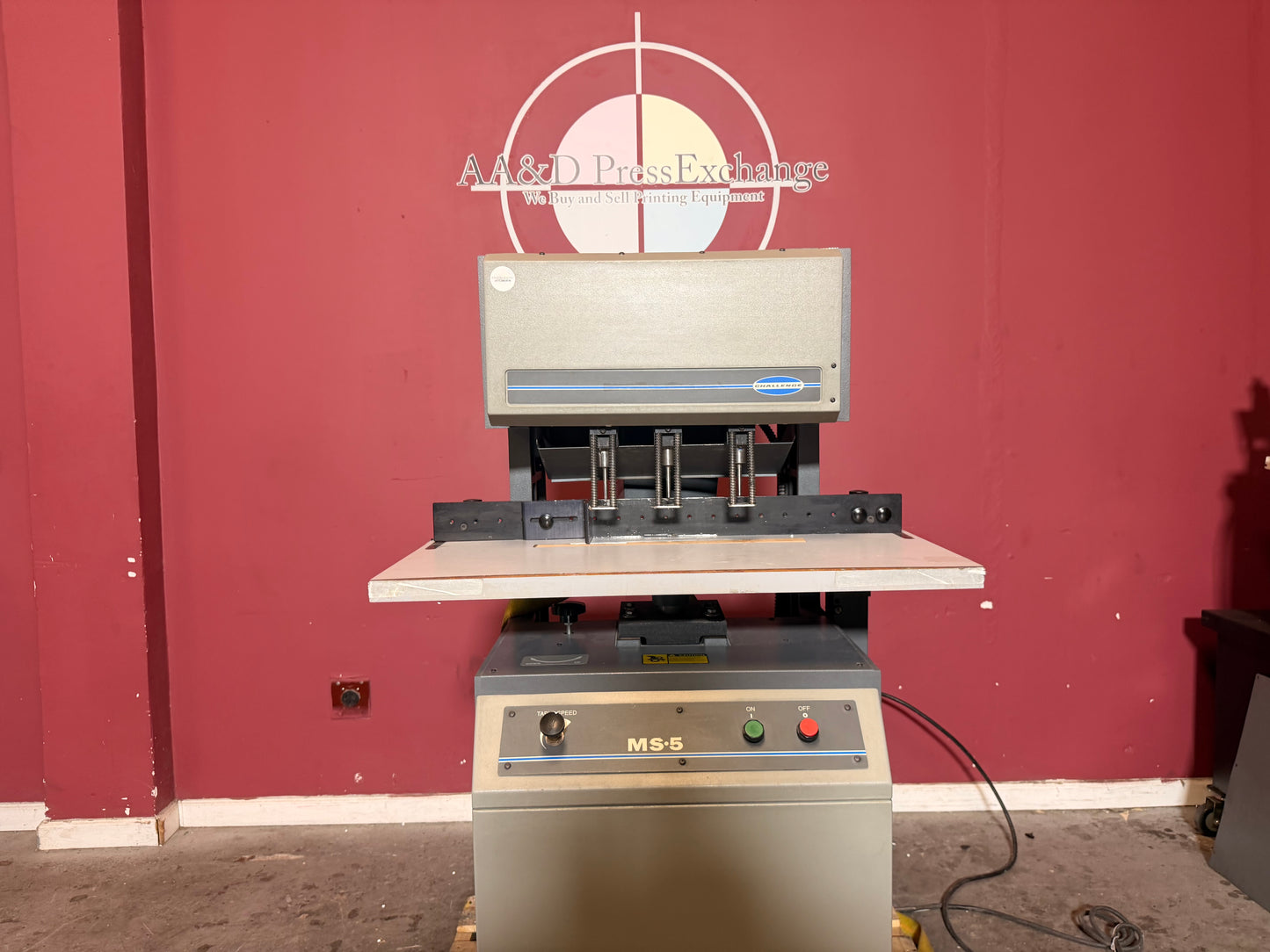 Used Challenge MS-5 paper drilling machine for sale operator control and foot pedal area