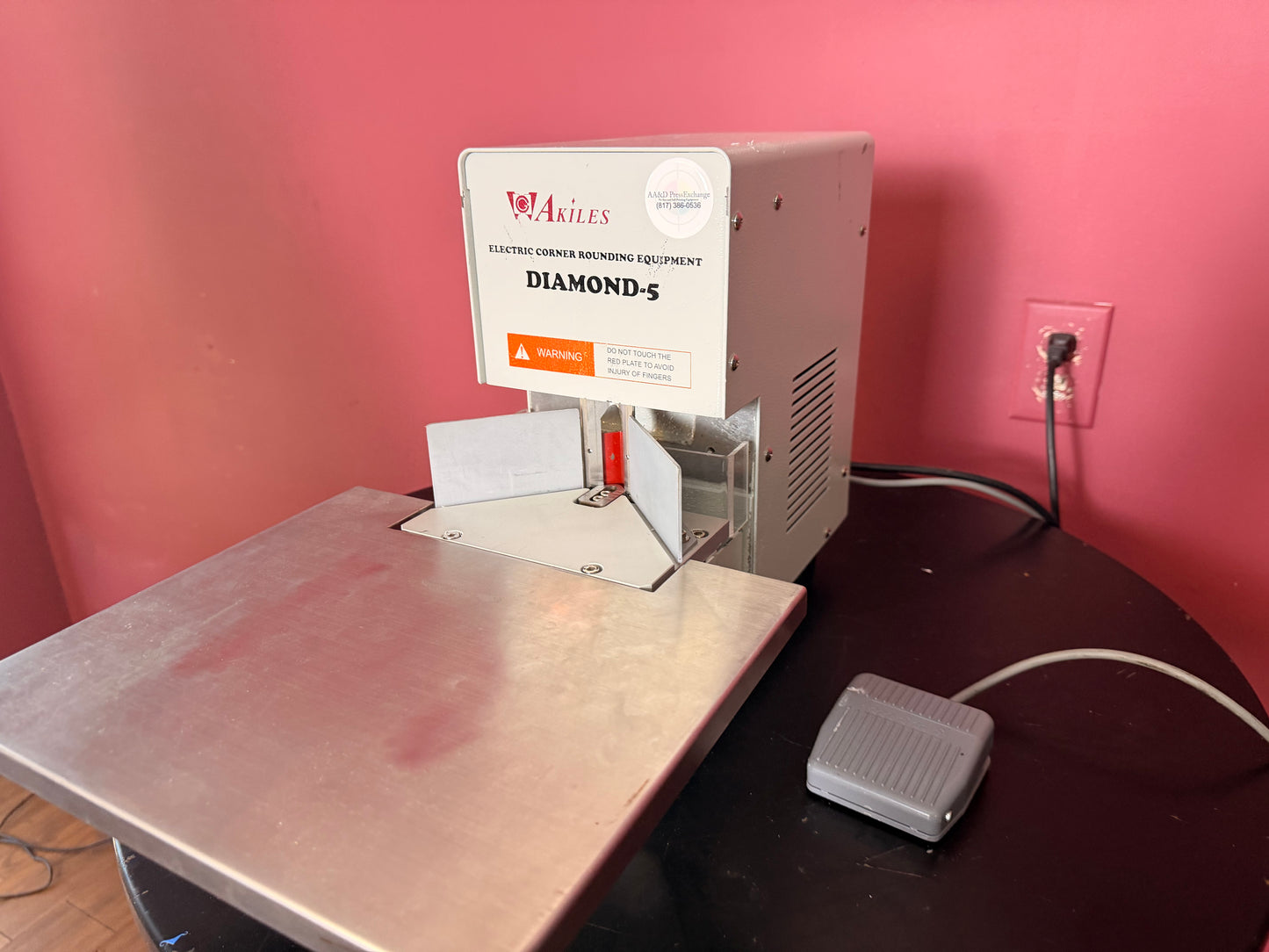 Used Akiles Diamond-5 electric corner rounding machine angled view for industrial finishing – AA&D PressExchange