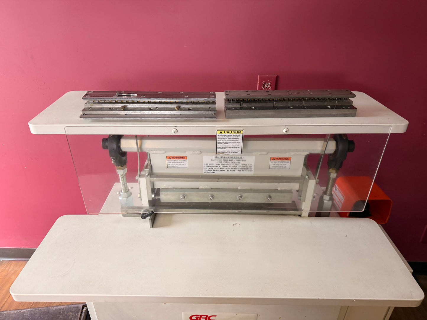 Used GBC Sickinger MHP 17 paper punch showing interchangeable die setup and punching area