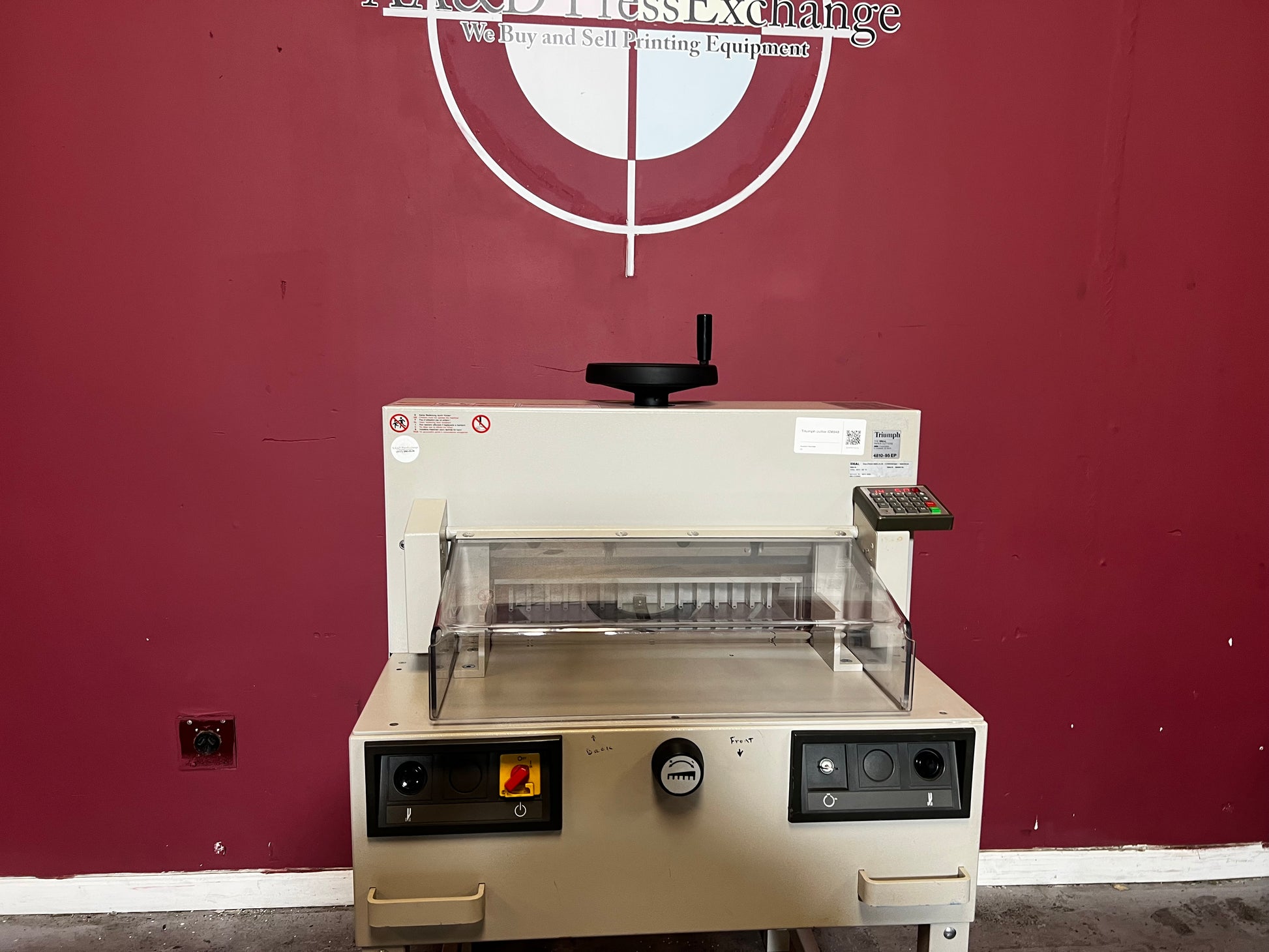 Used Triumph 4810-95EP paper cutter side view with safety guard – AA&D PressExchange