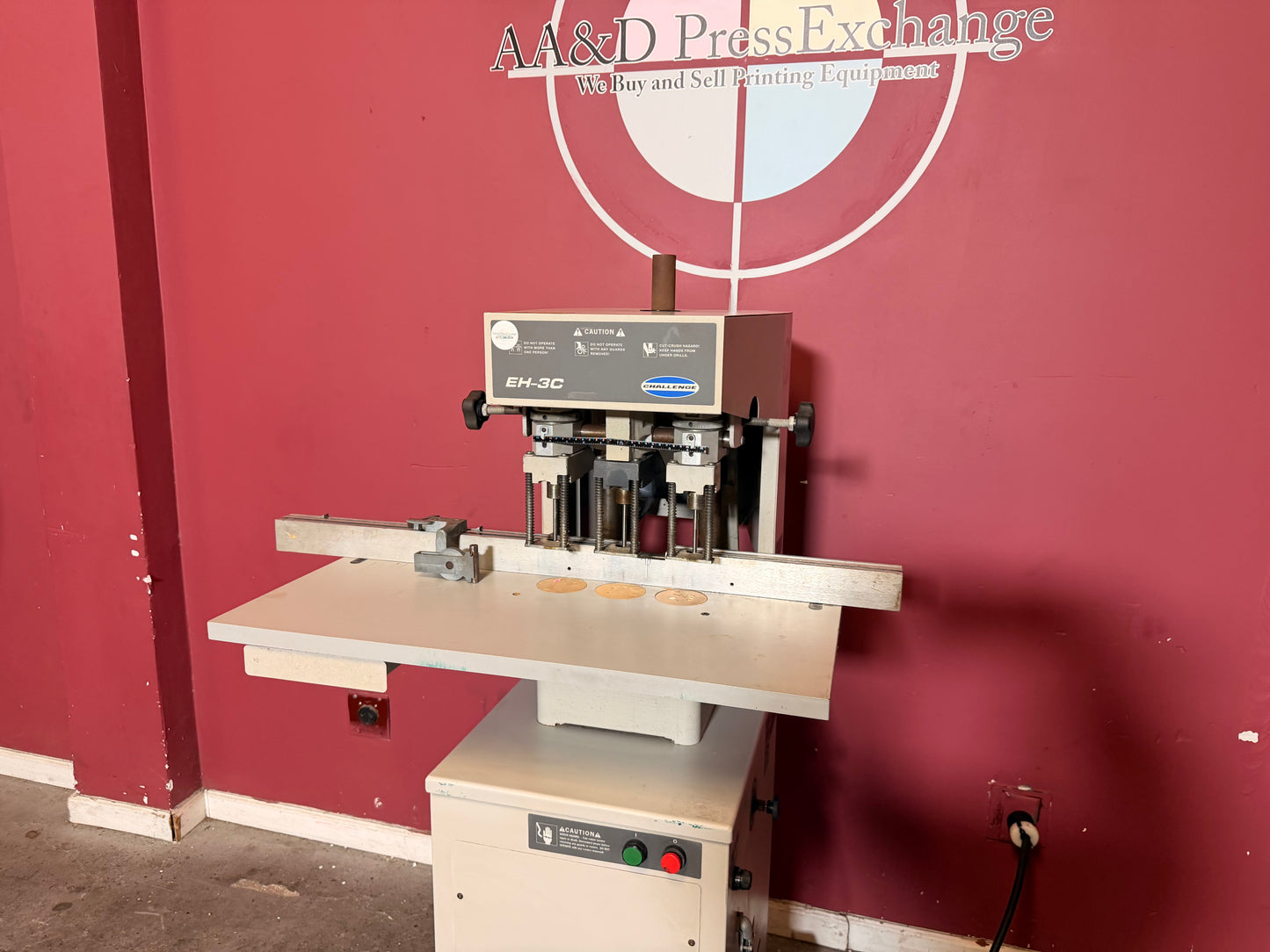 Used Challenge EH-3C Paper Drill adjustable head system for fast setup