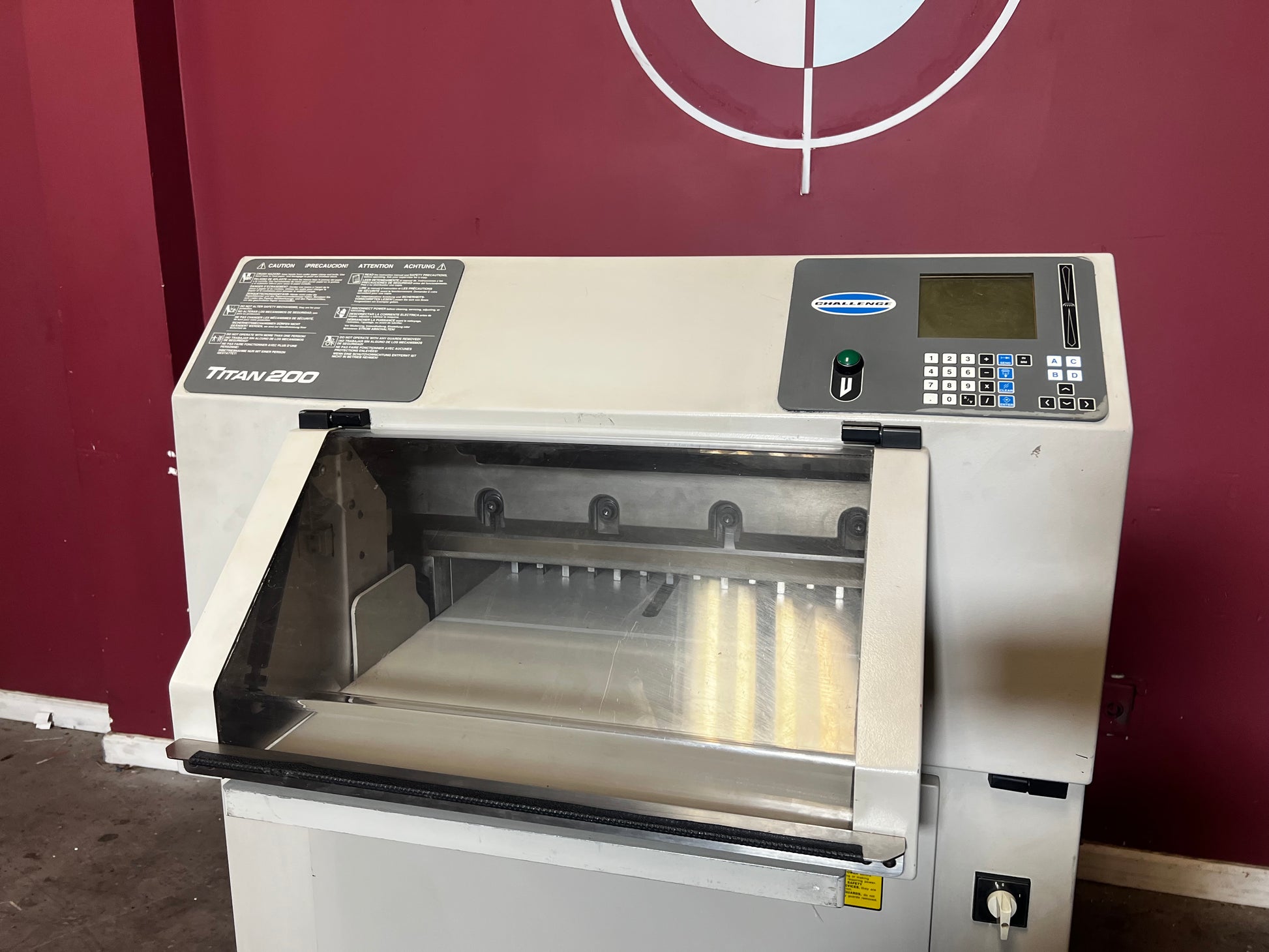 AA&D PressExchange used Challenge Titan 200 Hydraulic Paper Cutter showing programmable memory feature.