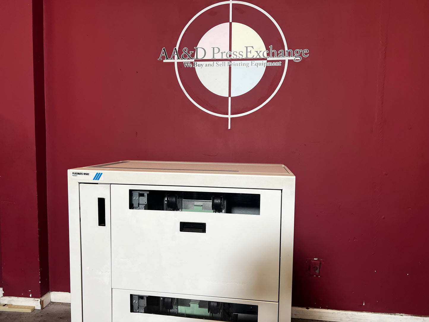 Used Plockmatic VF602 dual-bin vacuum feeder front view used with booklet makers – AA&D PressExchange