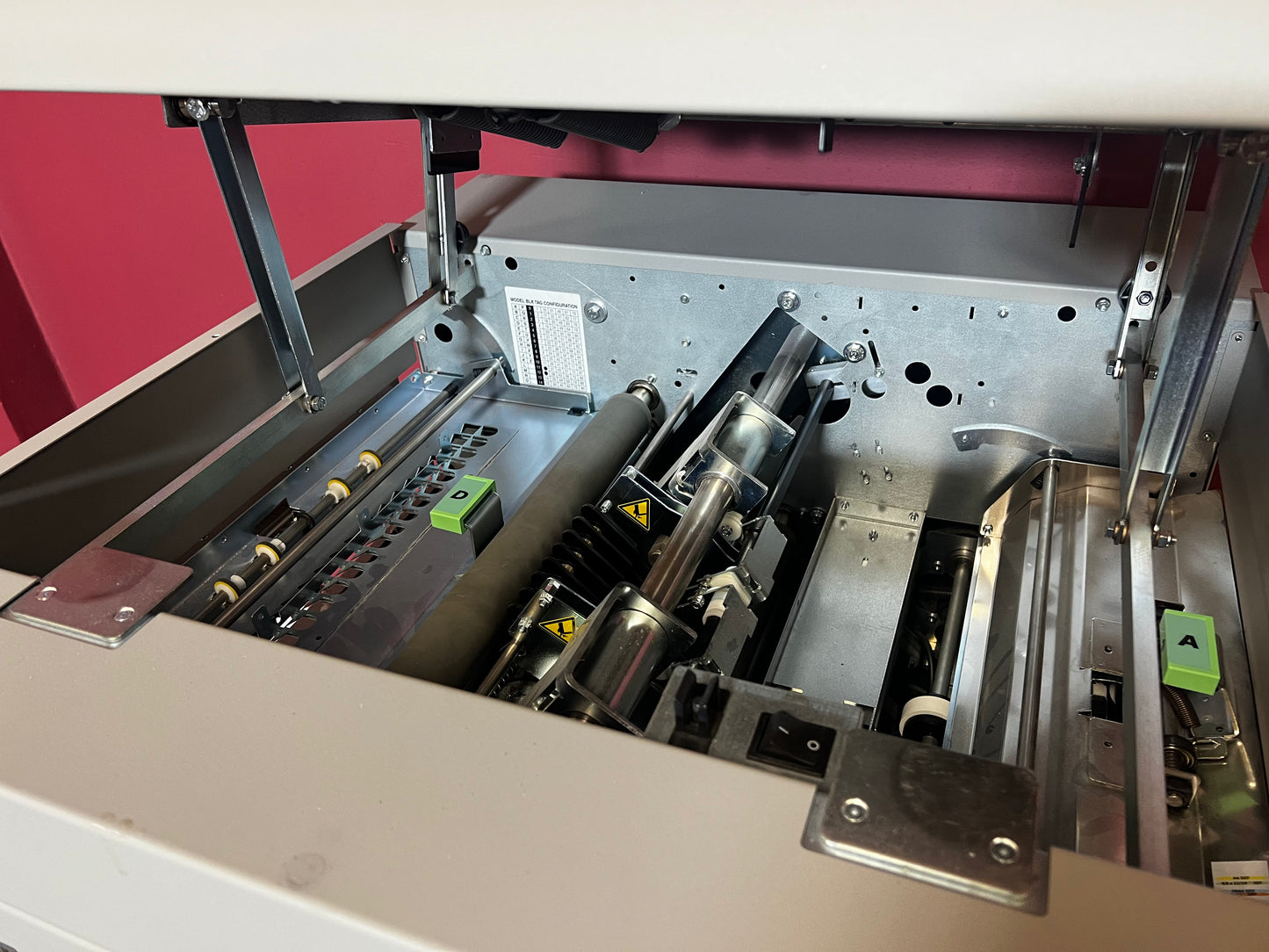 Used Plockmatic RCT II side view showing trim and crease functions in booklet making system – AA&D PressExchange