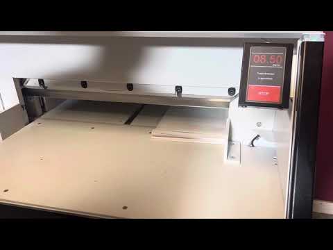  Used Triumph 6660 paper cutter overview in high-volume print production environment – AA&D PressExchange
