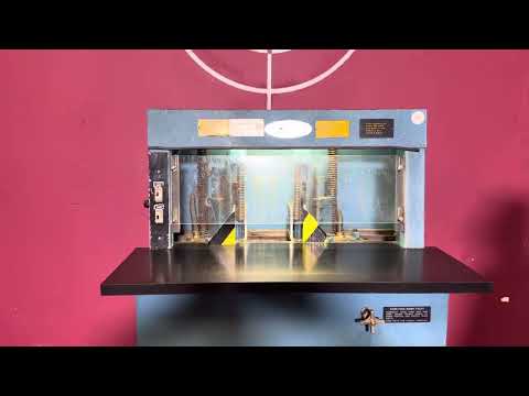 Used Challenge DCM Double Round Cornering Machine in operation rounding corners on paper stacks